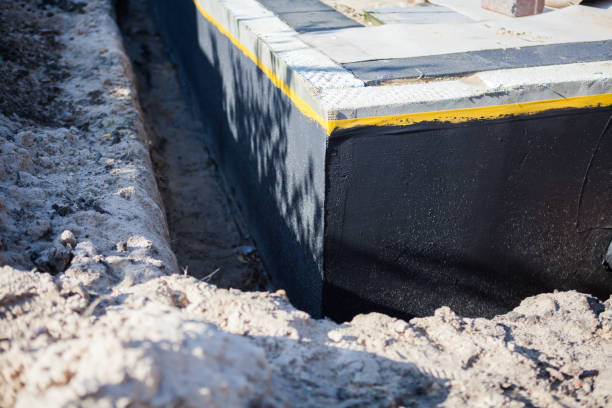 Professional Emergency Waterproofing technician working in Waterford, MI
